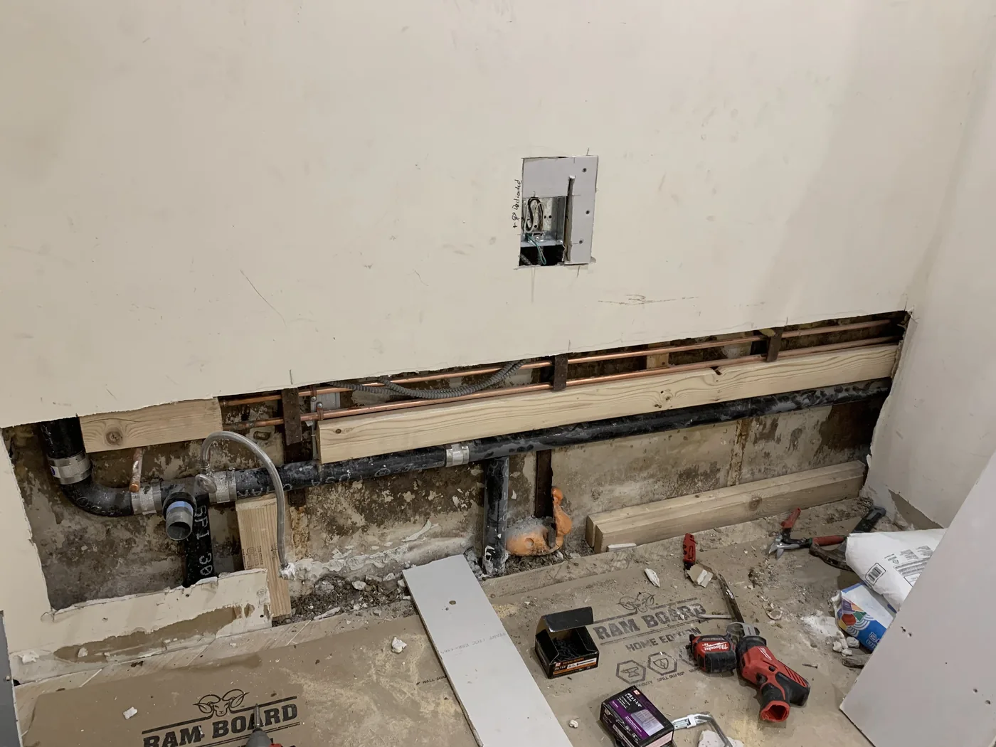 Bathroom rough-in before drywall, ceiling, and tile installation