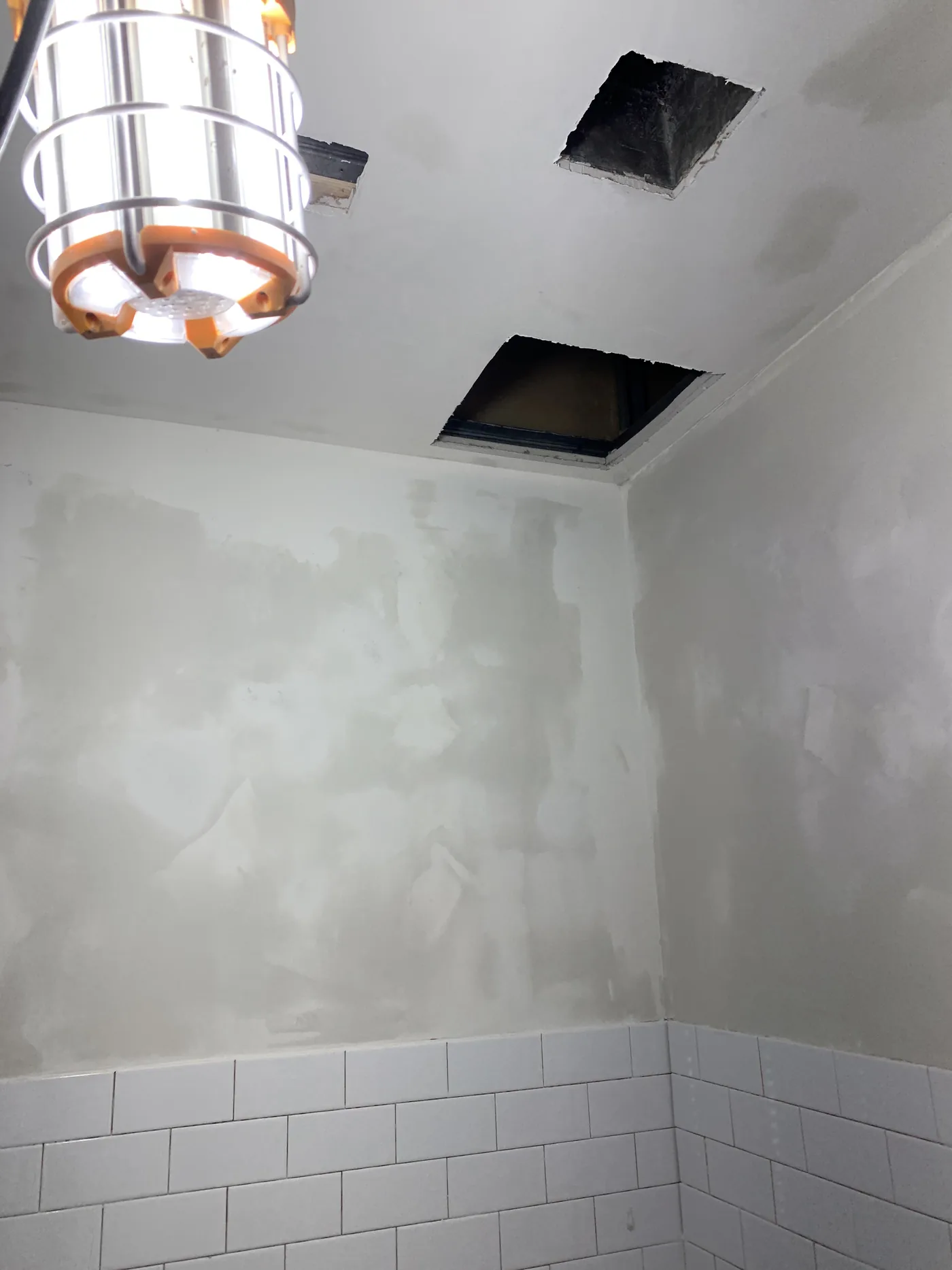 Drywall repairs and leveling across the commercial interior