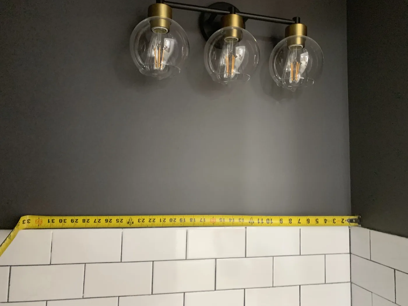 Final tile and lighting details after cleanup and finishing touches