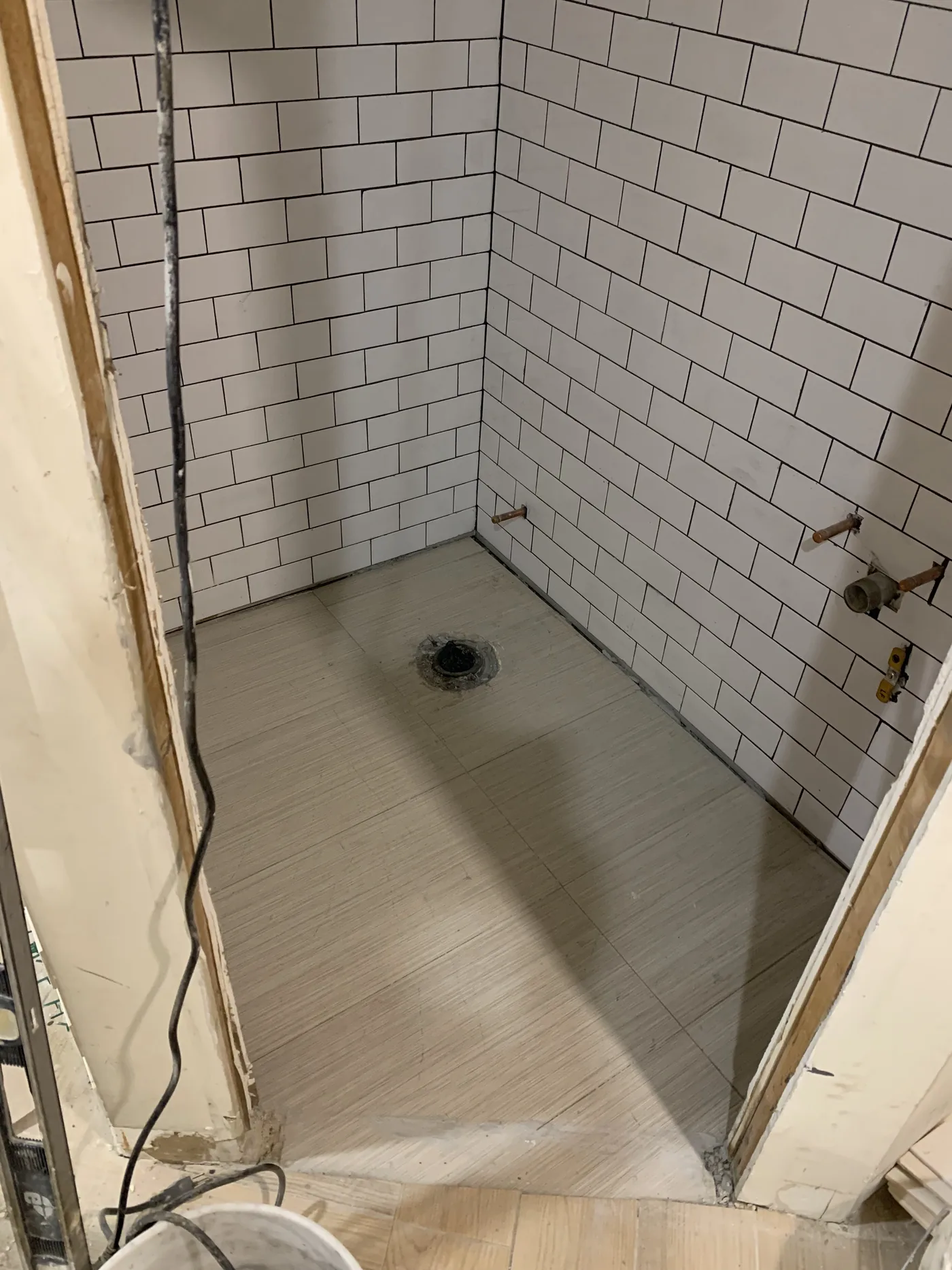 Tile installation detail inside the restroom area