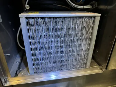 Clean AC evaporator coil after professional deep-cleaning service by Repair ASAP LLC in NYC