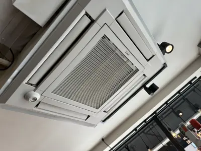 Ceiling cassette mini-split AC unit professionally installed in a NYC commercial or retail space