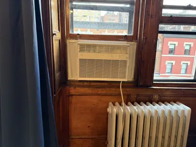 Window air conditioner installation completed in Manhattan apartment