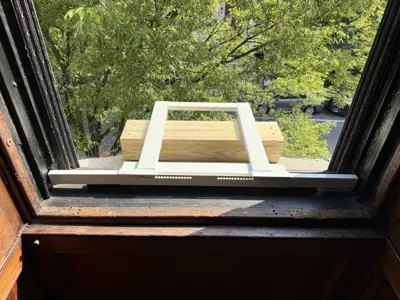 Window air conditioner installed in slider/casement window NYC