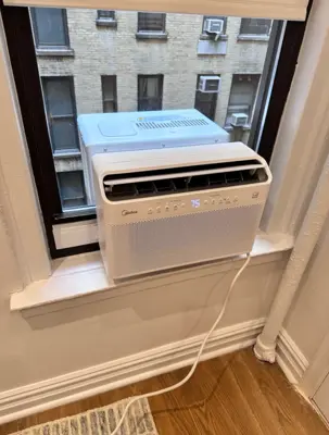 Midea U-Shape window AC unit installed in NYC apartment
