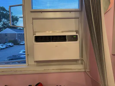 Frigidaire window AC 12,000 BTU installed in living room, Bronx NY