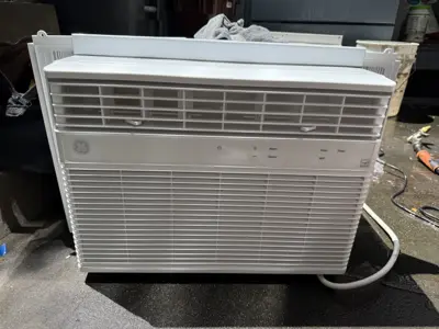 Completed LG 8,000 BTU window AC in NYC bedroom