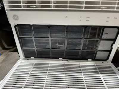 Window AC cord management after installation in NYC