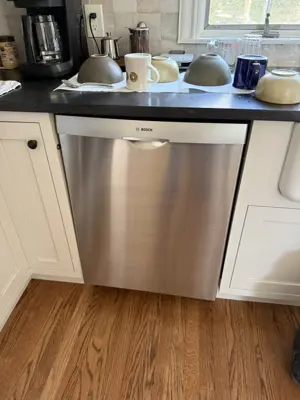 Dishwasher installation and plumbing connection