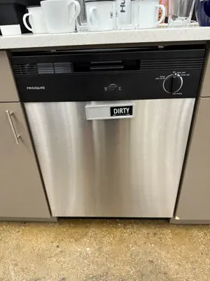 Dishwasher installation with plumbing and electrical connection