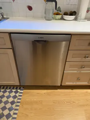 Dishwasher installation and plumbing connection