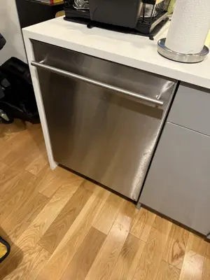 Dishwasher installation and plumbing connection