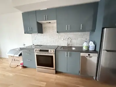 Microwave or range hood installation above stove