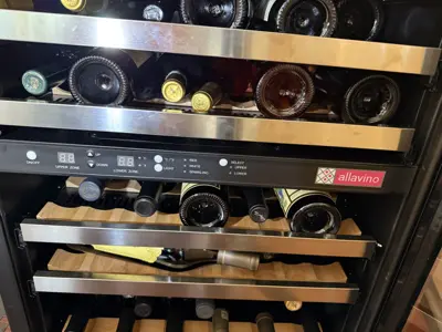 Allavino dual-zone wine cooler fully stocked and installed by NYC appliance handyman