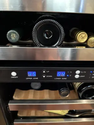 Dual-zone wine cooler displaying temperature settings after professional installation by Repair ASAP LLC