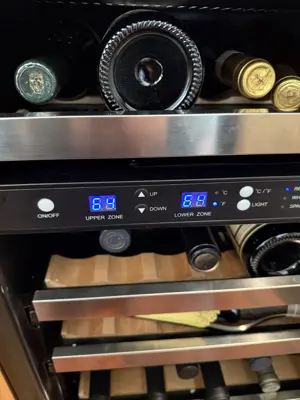 Dual-zone wine cooler control panel displaying temperature settings after appliance service in NYC