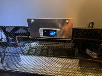 Commercial refrigerator digital temperature controller displaying 38°F after repair in NYC