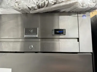 Kelvinator Commercial refrigerator control panel and digital display during appliance service in NYC