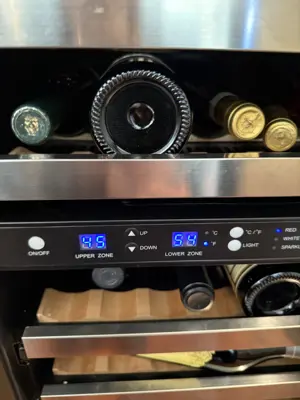Dual-zone wine cooler installed and running with temperature controls visible after NYC appliance installation