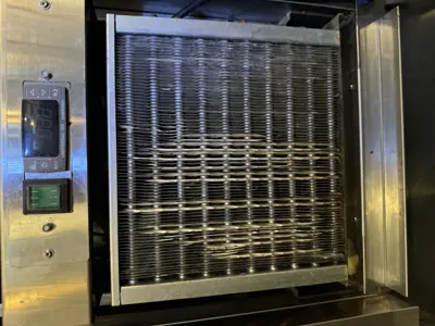 Clean stainless steel appliance condenser coils after professional deep cleaning service in NYC