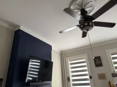Ceiling fan installation with wiring and mounting