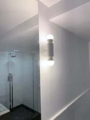 Light fixture installation — new fixture wired and mounted