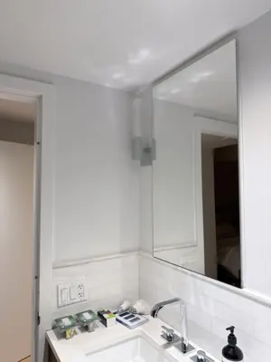 Light fixture installation — new fixture wired and mounted