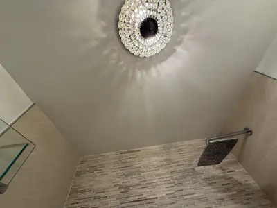 Light fixture installation — new fixture wired and mounted