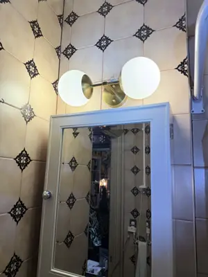 Light fixture replacement — old fixture removed and new one installed