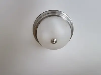 Light fixture installation — new fixture wired and mounted