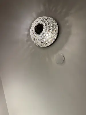 Light fixture installation — new fixture wired and mounted