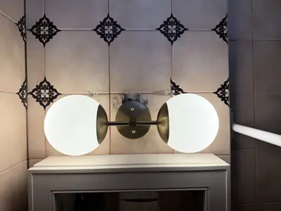 Light fixture replacement — old fixture removed and new one installed