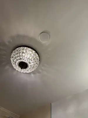 Light fixture installation — new fixture wired and mounted