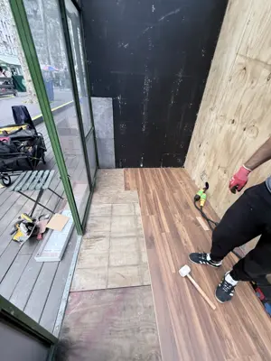 Click-lock flooring installation in a NYC apartment