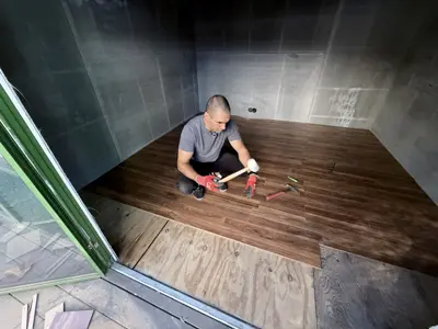 Click-lock flooring installation in a NYC apartment