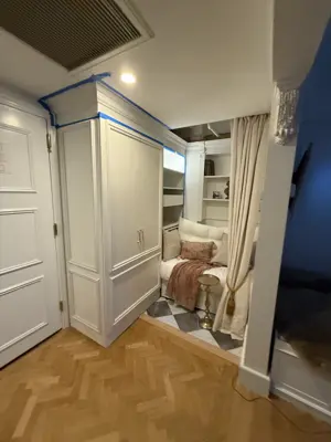 IKEA PAX wardrobe project with custom cornice and trim work