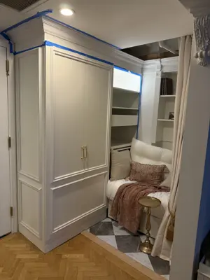 IKEA PAX wardrobe project with custom cornice and trim work