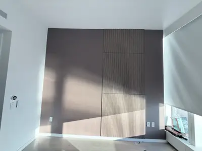 Decorative wall panel installation — accent wall created