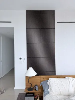 Decorative wall panel installation — accent wall created