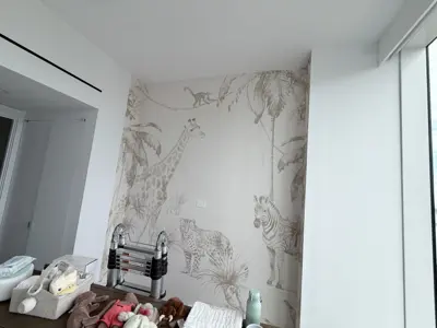 Professional wallpaper installation on interior walls