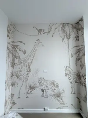 Professional wallpaper installation on interior walls