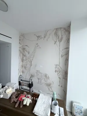 Professional wallpaper installation on interior walls