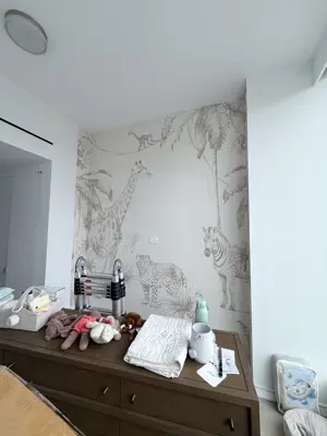 Professional wallpaper installation on interior walls