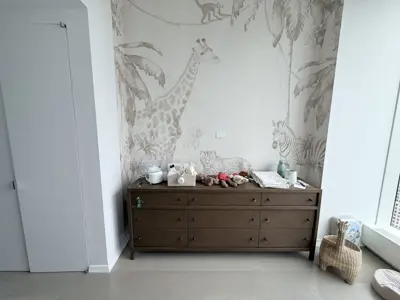 Professional wallpaper installation on interior walls