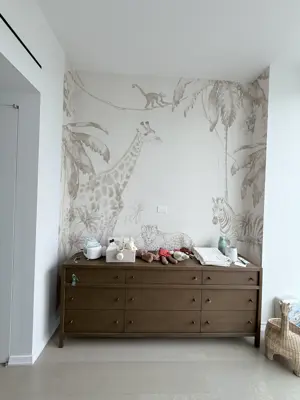 Professional wallpaper installation on interior walls