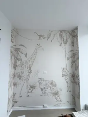 Professional wallpaper installation on interior walls