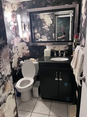 Professional wallpaper installation on interior walls