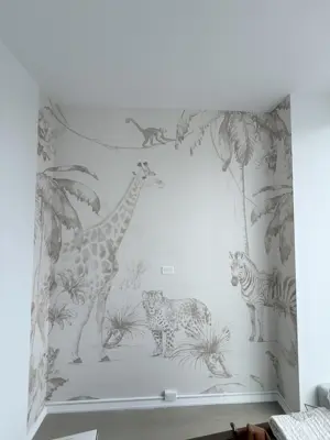 Professional wallpaper installation on interior walls