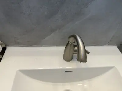 New faucet installation with plumbing connection