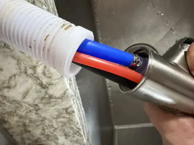 New faucet installation and plumbing connection